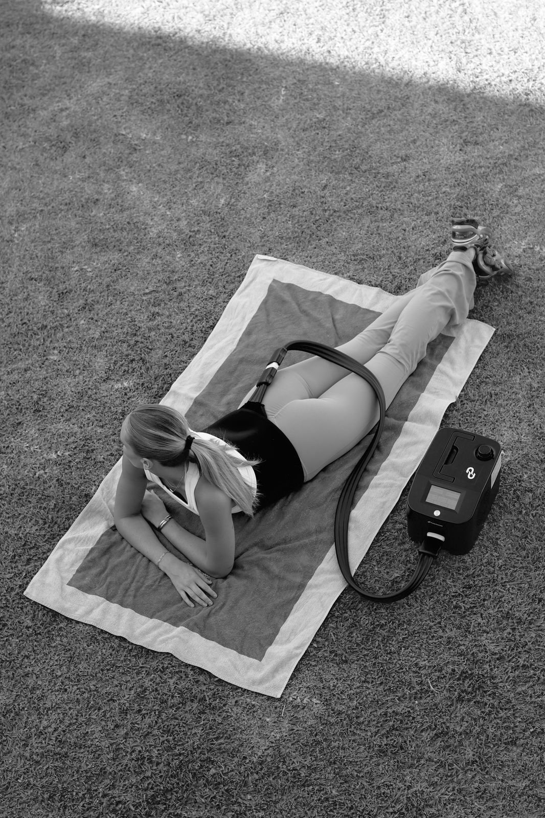 Athlete using the Pulse One lower back wrap outdoors